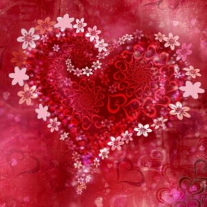 stylized pink and red flowers in a heart shape on a red background